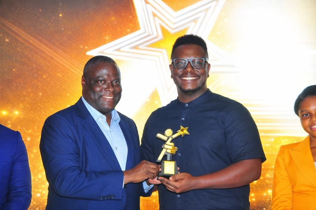 Receiving the Digital Entrepreneur of the Year award at the Tanzania Emerging Youth Awards